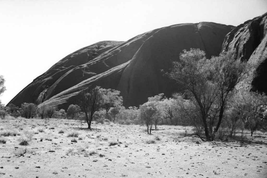 Black and white photograph of Uluru