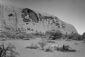 Black and white photograph of Uluru